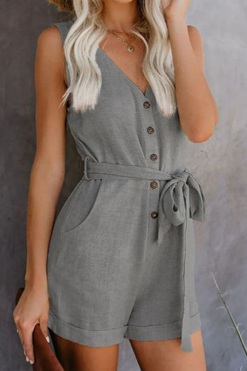Alluring V-neck layered romper in gray with button front, sleeveless design, high waist drawstring, and side pockets for a flattering casual look