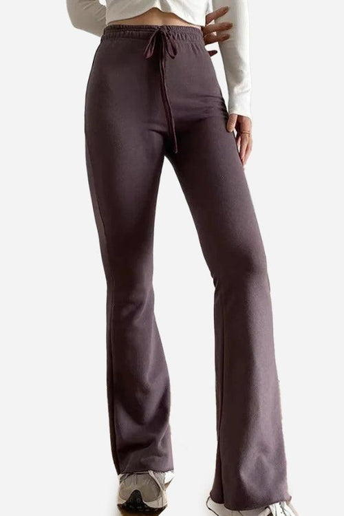 Comfy wide-leg pants in sustainable breathable fabric with flared style and elastic waistband.