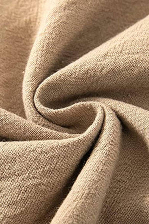 Close-up of beige high-waist palazzo pants fabric made of cotton and linen blend