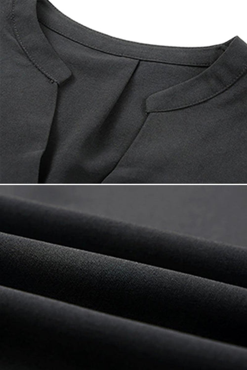 Close-up of black Dainty Charm Casual Ruffle Dress fabric and neckline details made of breathable polyester