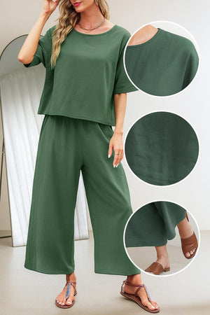 Women's green loose fit co-ord set with short sleeves and wide-leg pants, relaxed casual outfit for comfort and style