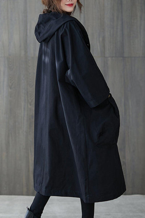 Black oversized water resistant windbreaker jacket with hood and pockets for women