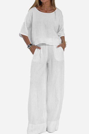 White short-sleeved pullover and wide trouser matching set in breathable cotton with deep pockets and relaxed fit