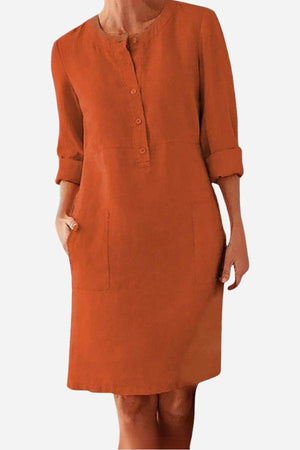 Rust orange cotton dress with rolled 3/4 sleeves and button front detail
