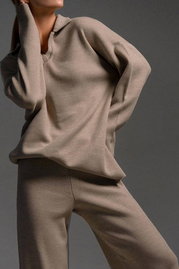 woman wearing plush and preppy camel two-piece knit set with polo collar and wide-leg pants