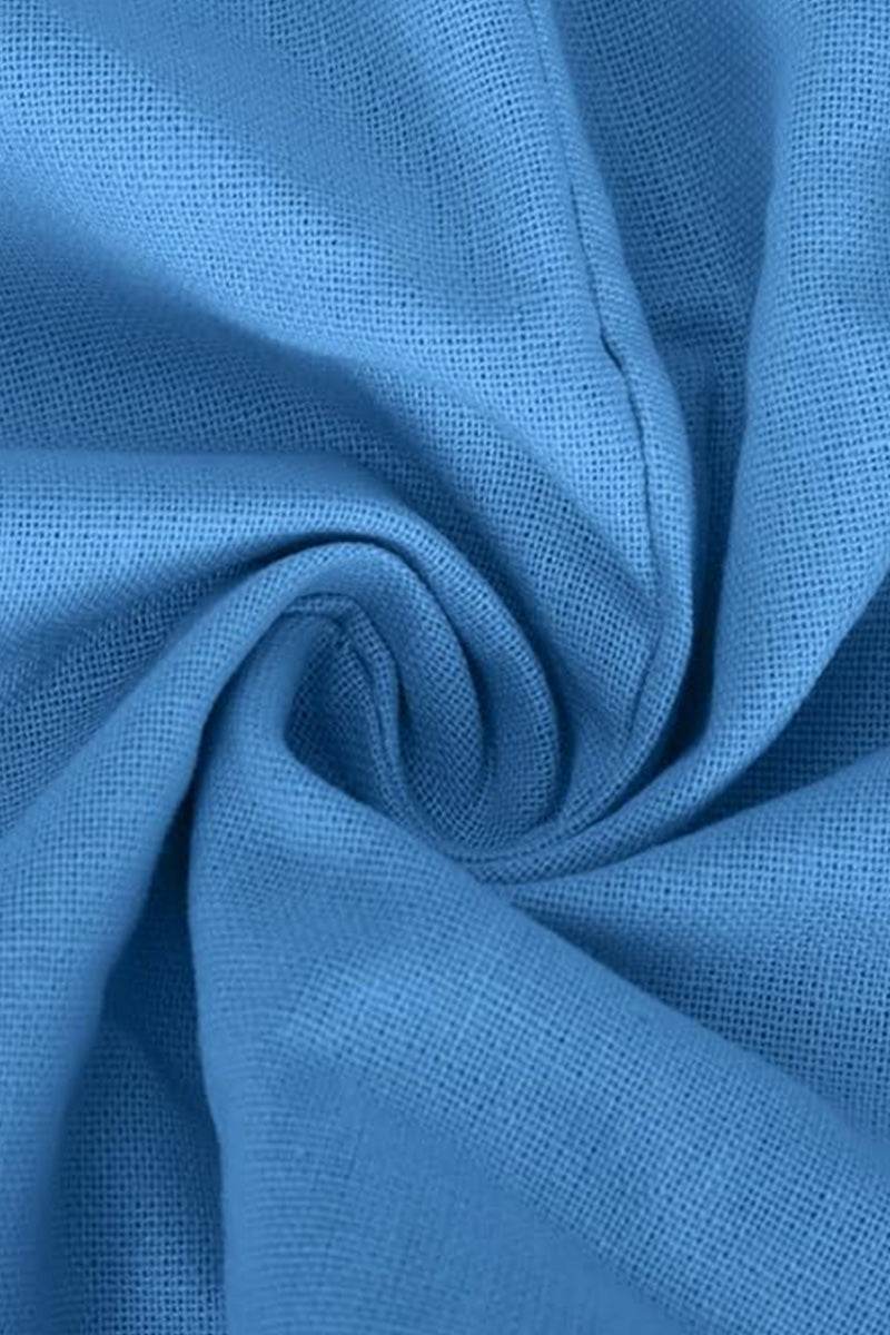 Close-up of soft blue cotton fabric for V-neck cotton two-piece trouser set