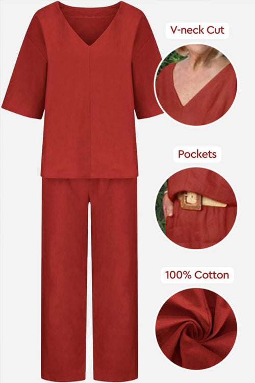 Red V-neck cotton two-piece trouser set with mid-length sleeves and pockets, made of 100% soft cotton fabric.