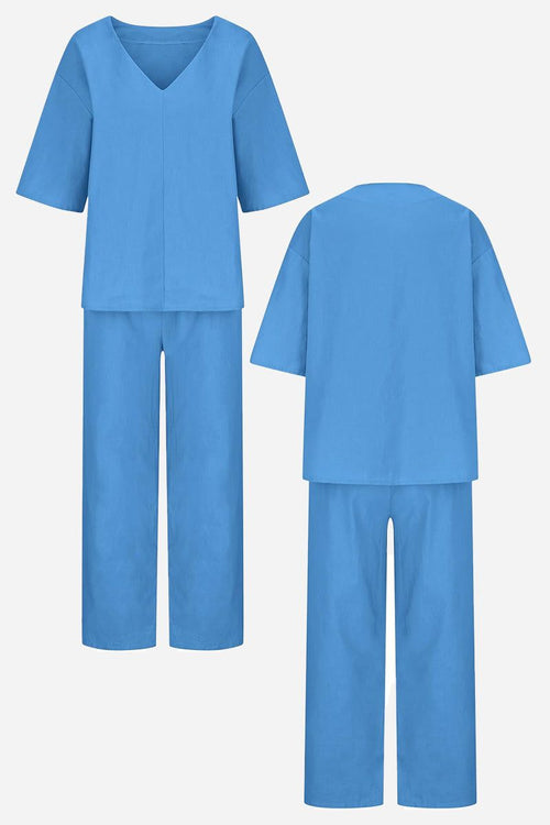 Blue V-neck cotton two-piece trouser set with relaxed top and straight-leg pants, front and back views