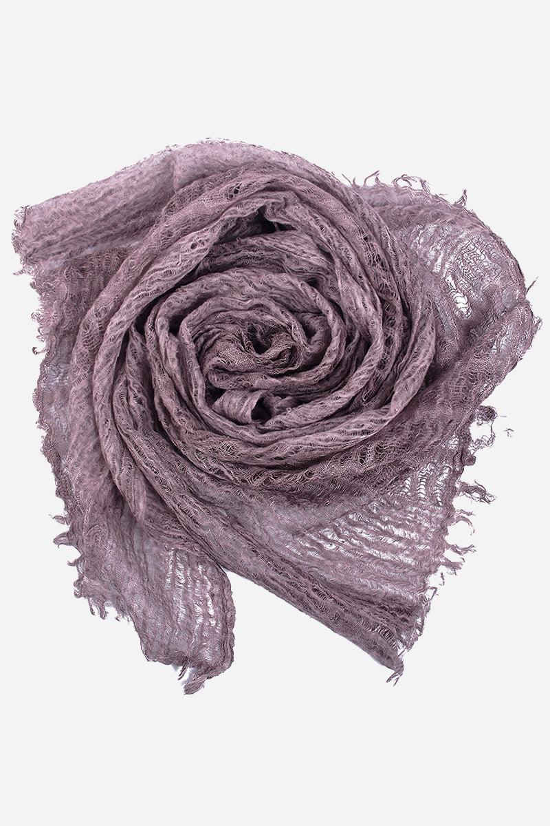 Lightweight linen scarf in soft purple with frayed edges, breathable and versatile accessory.