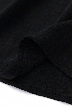 Close-up of lightweight black fabric used for high waist wide leg pants