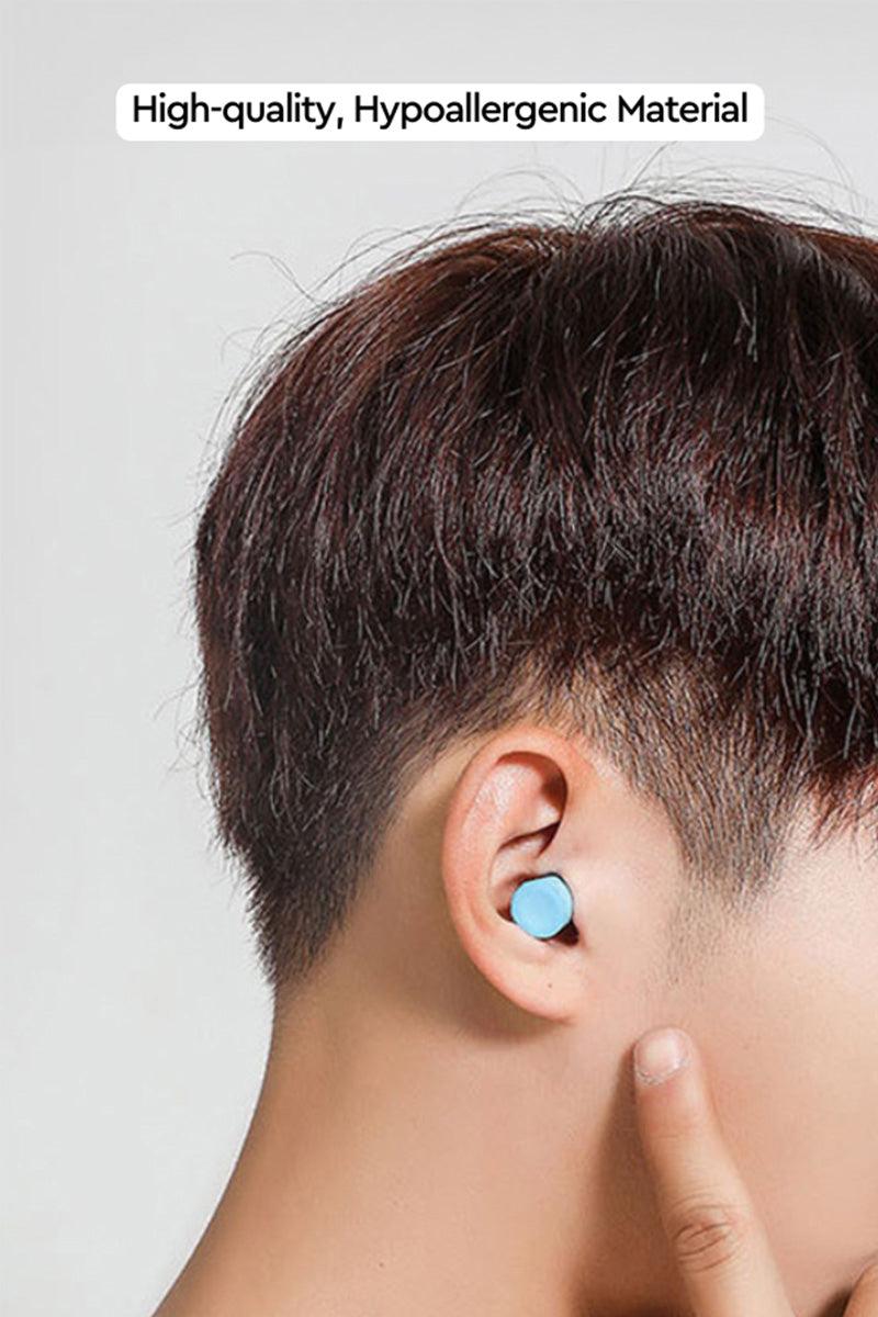 Man wearing blue noise-blocking earplugs from Travel Comfy Kit made of high-quality hypoallergenic material