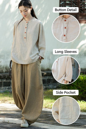 Woman wearing loose beige ramie linen and cotton blouse with button detail, long sleeves, and side pocket in casual outdoor setting