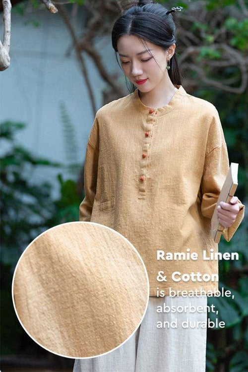 Woman wearing breathable ramie linen and cotton blouse in natural beige tone with button details and side pocket
