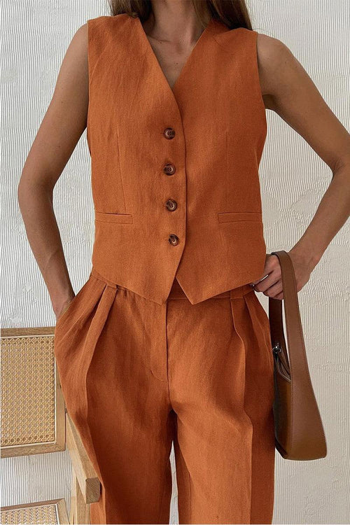 Woman wearing eco chic linen blend orange-brown two-piece vest and pants set with buttons