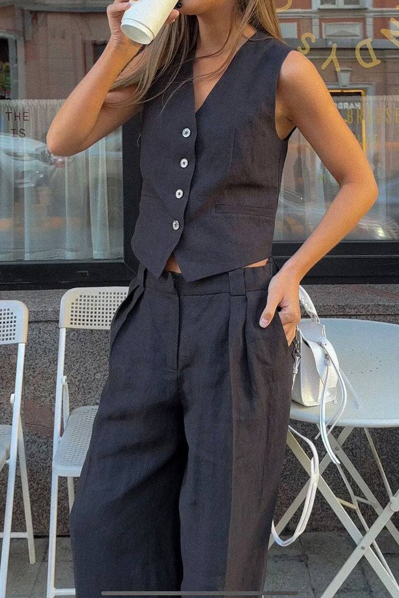 woman wearing eco chic linen blend black sleeveless vest and wide-leg pants two-piece outfit outdoors