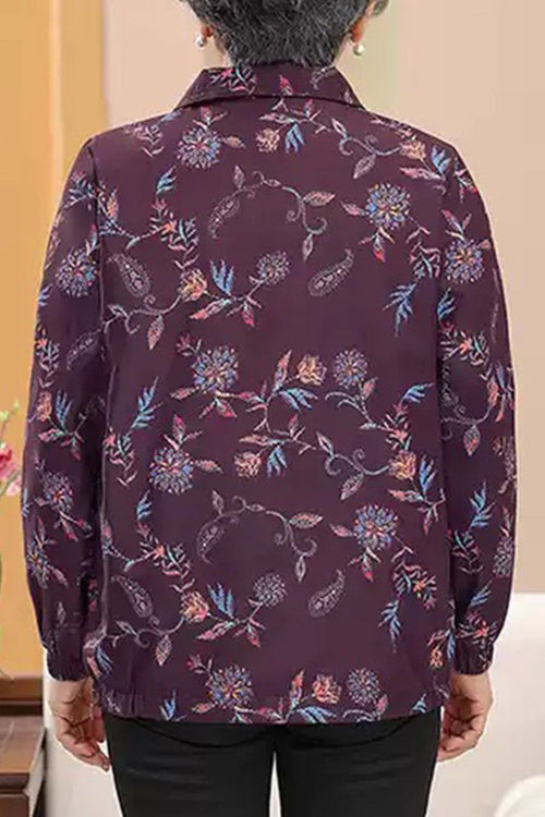 Plus Size WeatherShield floral jacket with water-resistant polyester fabric and floral print design
