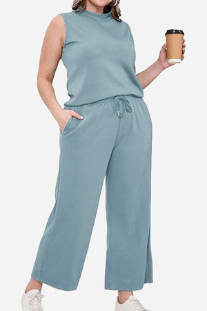 Cotton Chic Sleeveless two-piece set in soft blue with pockets, breathable wrinkle-resistant fabric, casual elegant travel outfit
