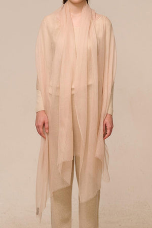 Lightweight 100% cashmere featherlight scarf in soft beige worn by model