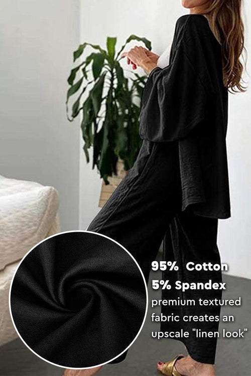 woman wearing black relaxed fit Vacation Essentials Cotton Set with premium textured fabric and linen look