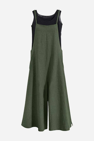 Olive green cotton blend comfort jumpsuit with wide legs and sleeveless design on black tank top background