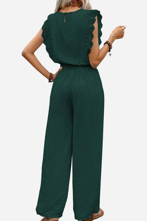 Elegant two-piece set in dark green with lace detail and relaxed fit, perfect for comfortable stylish wear.