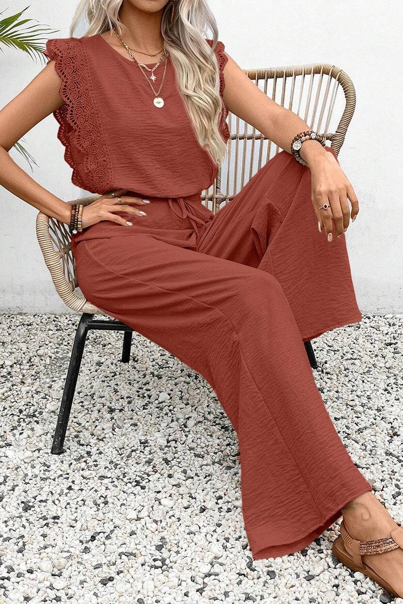 Elegant two-piece set in rust with lace detail on sleeveless top and wide-leg pants