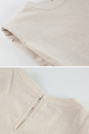 close-up of breathable cotton-linen blend beige fabric two-piece top with sleeveless design and back button closure