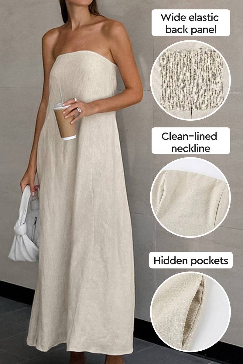 Strapless beige cotton linen blend dress with elastic back, clean neckline, and hidden pockets for a comfortable, elegant look