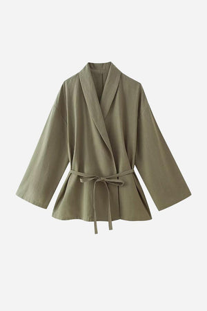 Olive green wide-leg top from Mix-Match Lounge-to-Travel Set with belted waist and relaxed fit