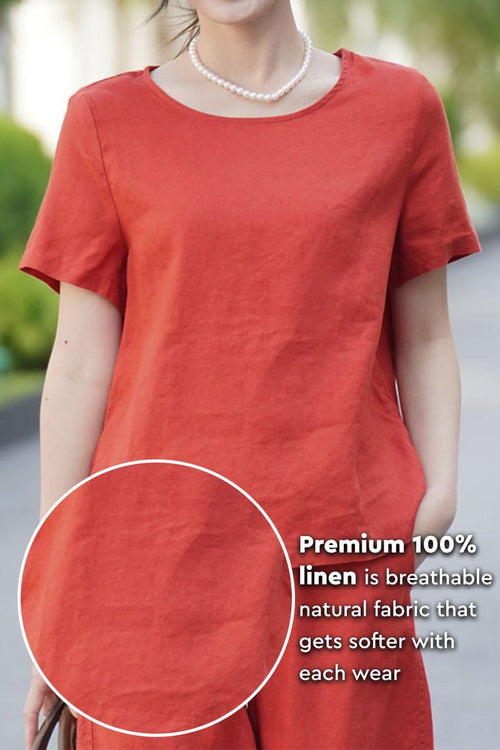 Woman wearing breathable 100% pure linen short sleeve classic shirt in rust color with round neckline