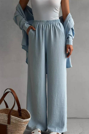 Light blue relaxed fit wide-leg two-piece set with wrinkle-resistant fabric, ideal for travel and casual wear.