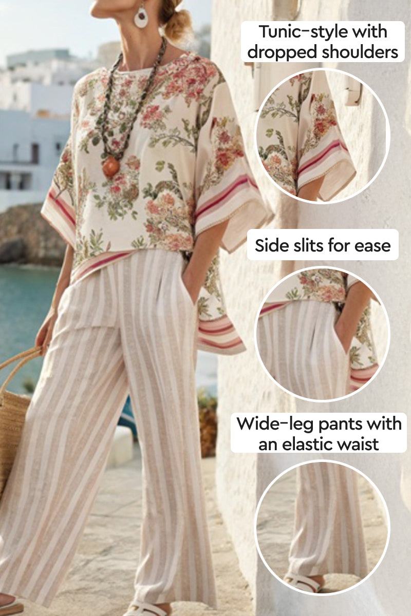 Woman wearing Coastal Comfort Linen two-piece set with floral tunic and striped wide-leg pants by seaside