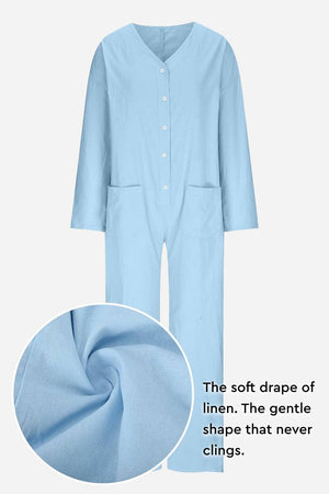 Light blue relaxed jumpsuit with button front and linen texture close-up, featuring soft drape and gentle shape.