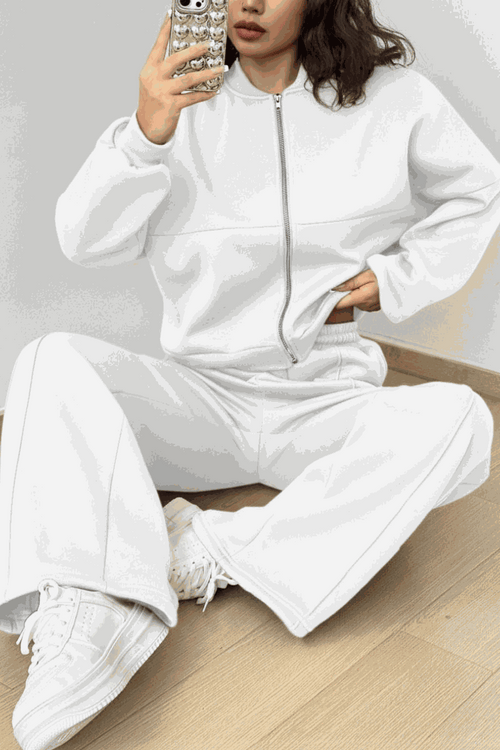 The Voyager Zip Set white zip-front sweatshirt and wide-leg joggers travel outfit