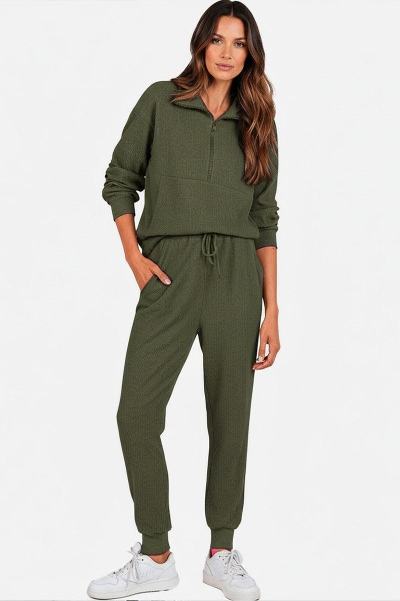 Unisex half-zip pullover and sweatpants set in olive green with casual relaxed fit and lightweight polyester blend