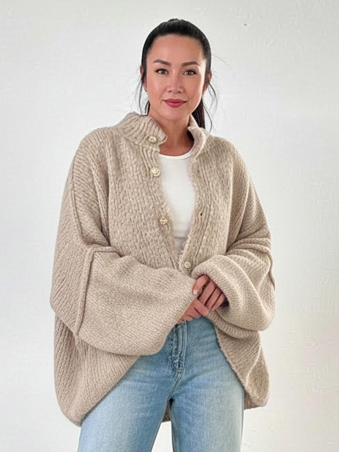Oversized button-front knit cardigan with balloon sleeves and gold-tone buttons in chunky knit texture