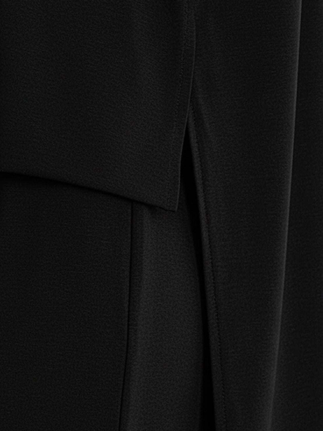 Oversized long-line loungewear set with short-sleeve pullover and wide-leg pants in soft knit fabric