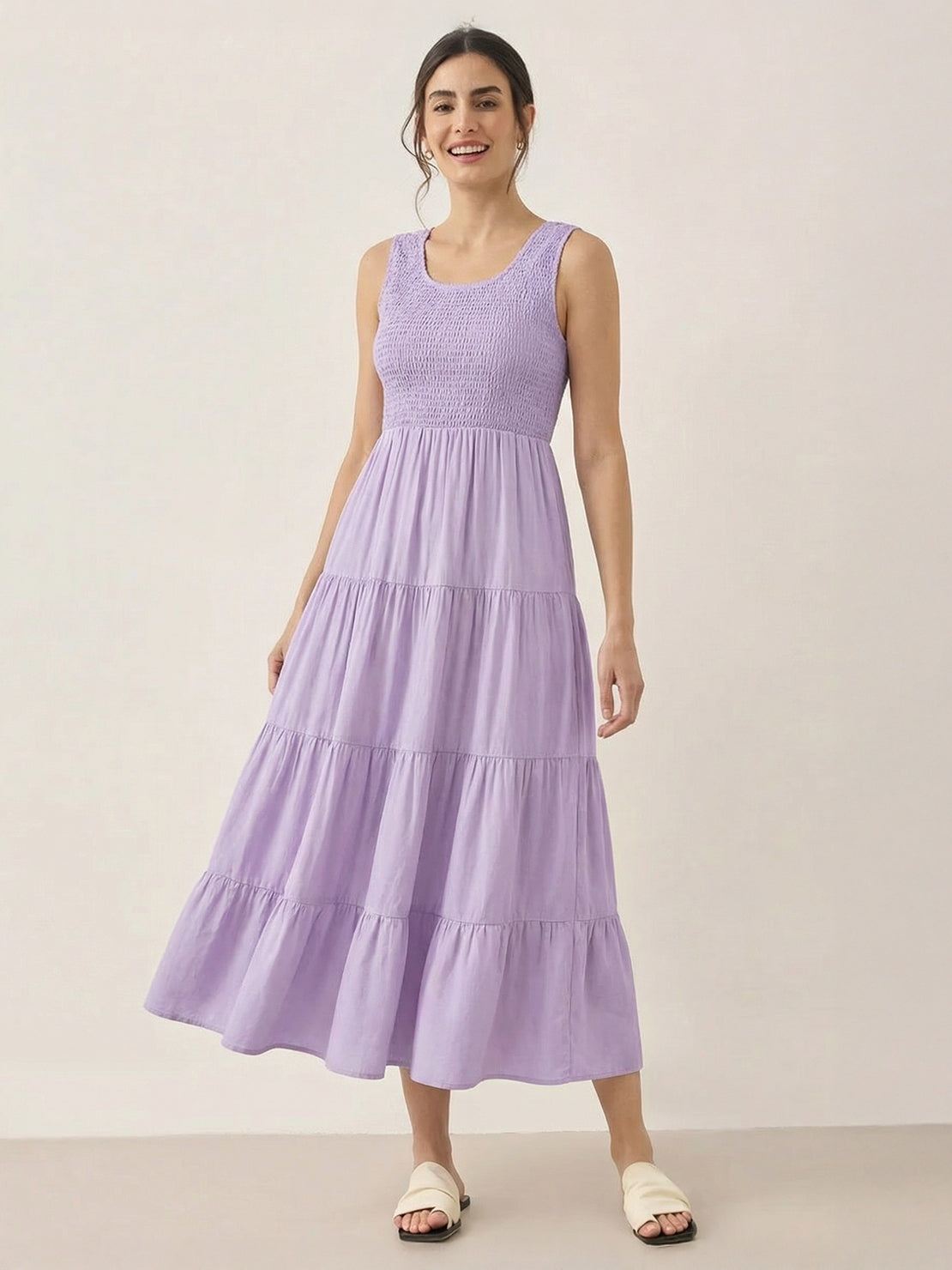 Smocked sleeveless maxi dress with tiered skirt and scoop neckline in lightweight fabric
