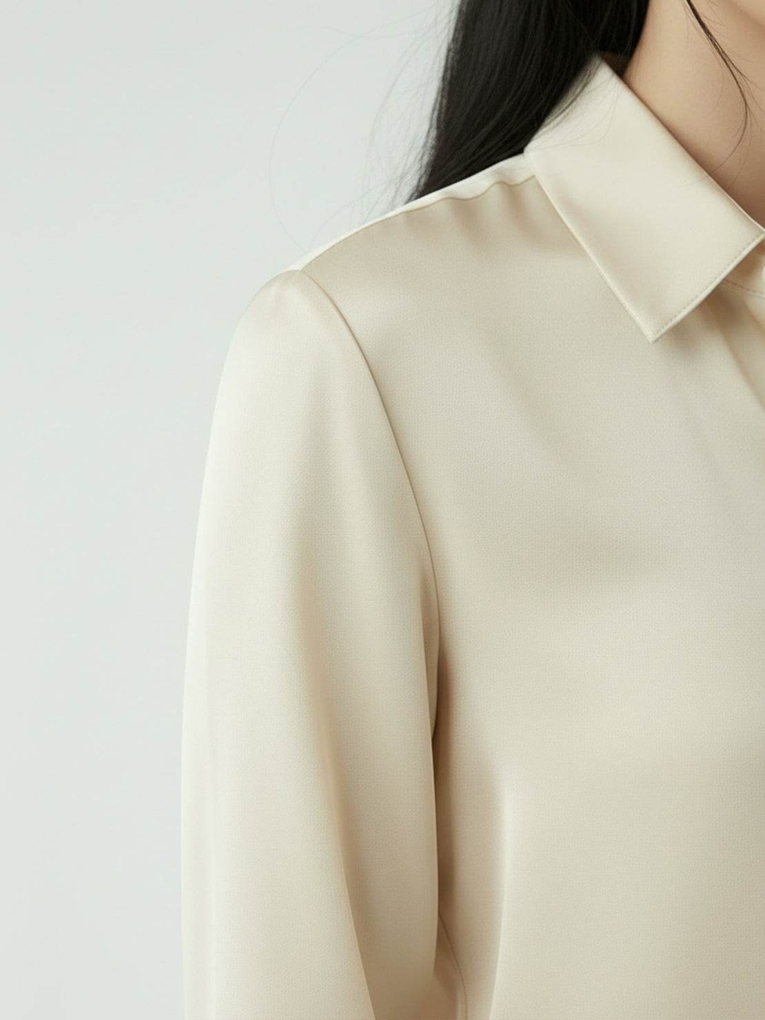 silk-finish button front shirt with traditional collar and curved hem in smooth fabric