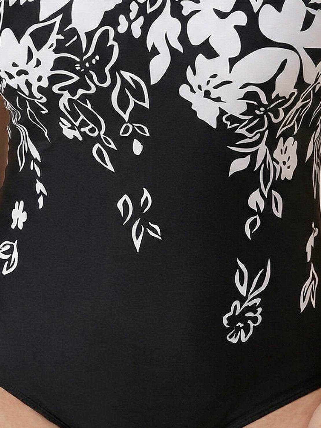 Curve-fit open-back swimsuit with scoop front, adjustable straps, and diagonal back panels