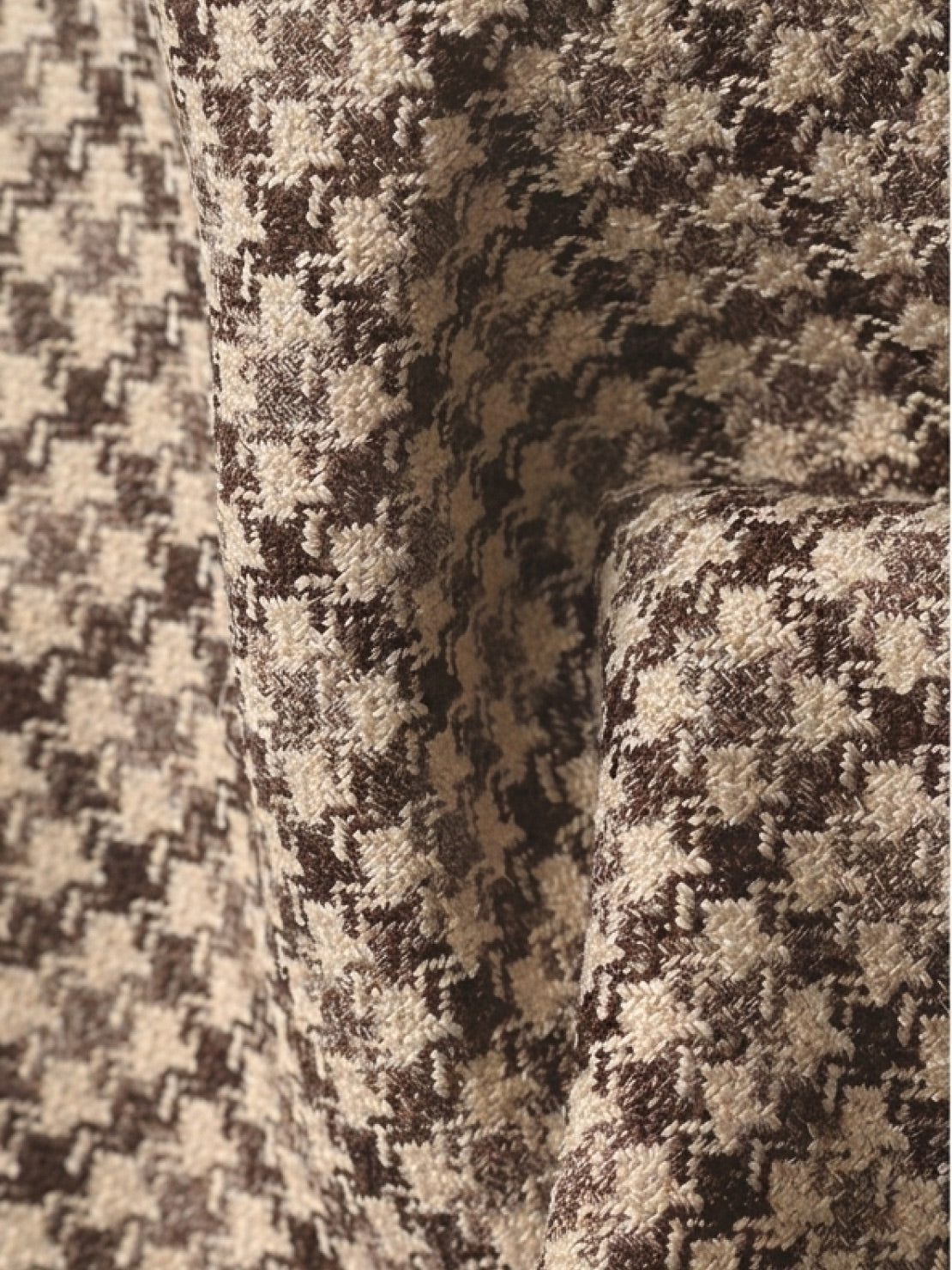 Structured black and white houndstooth commuter blazer with relaxed fit and notched lapel collar