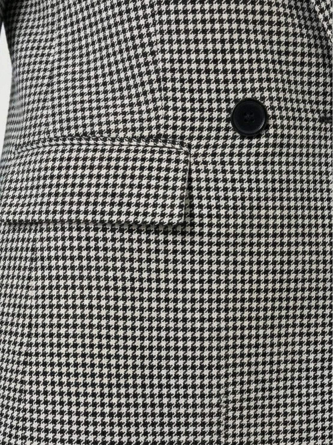 Black and white classic houndstooth commuter blazer with structured shoulders and double-button closure