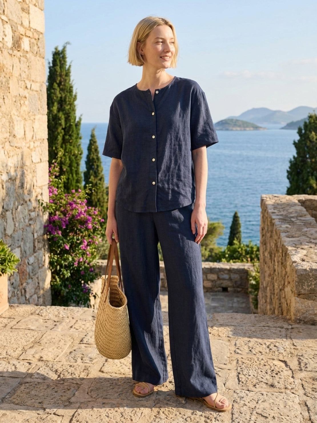 100% cotton two-piece set with button-front top and wide-leg pants in soft solid colors