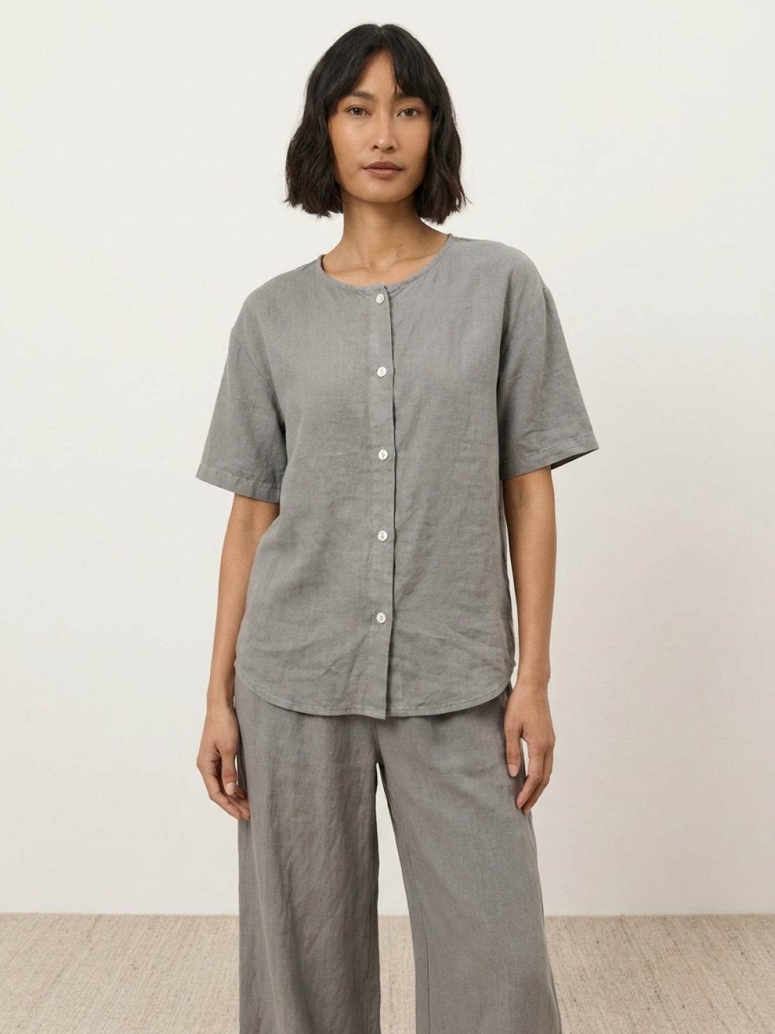 100% cotton two-piece set with button-front top and wide-leg pants in soft solid colors