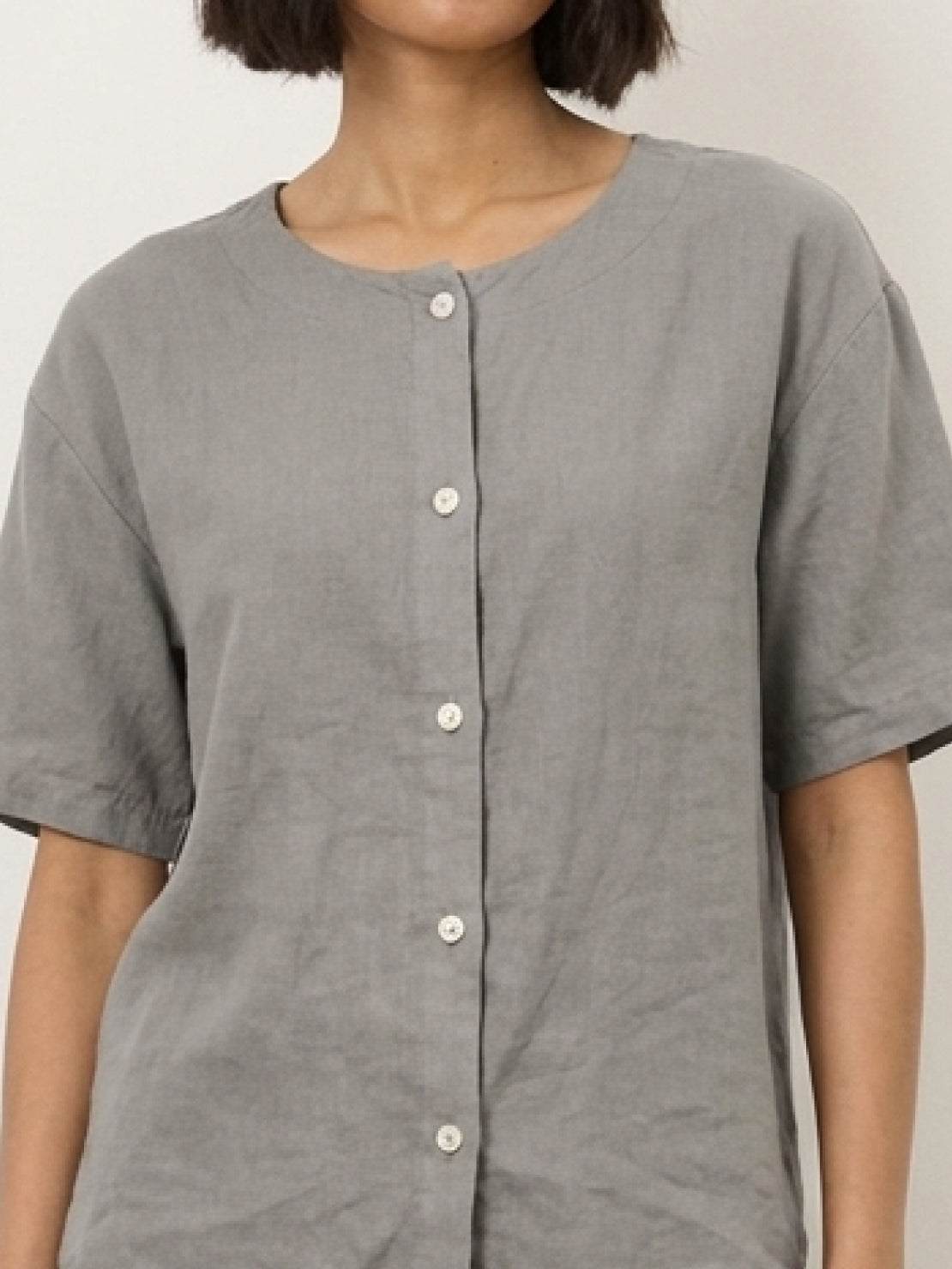 100% cotton two-piece set with button-front top and wide-leg pants in soft solid colors