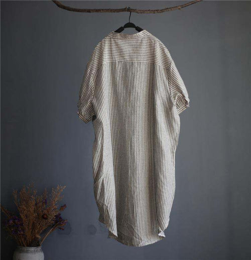 Striped linen blend gauze midi shirt dress with short sleeves and button fastening hanging on wooden hanger