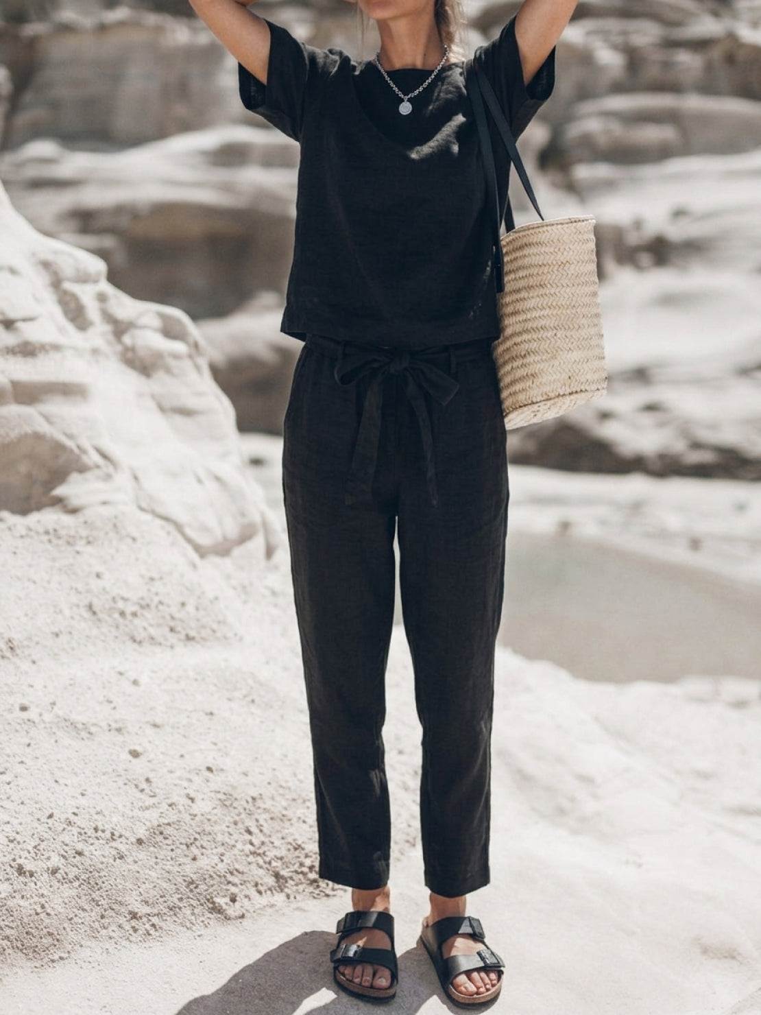 woman wearing relaxed monochrome cotton linen set with short sleeves and straight-leg pants