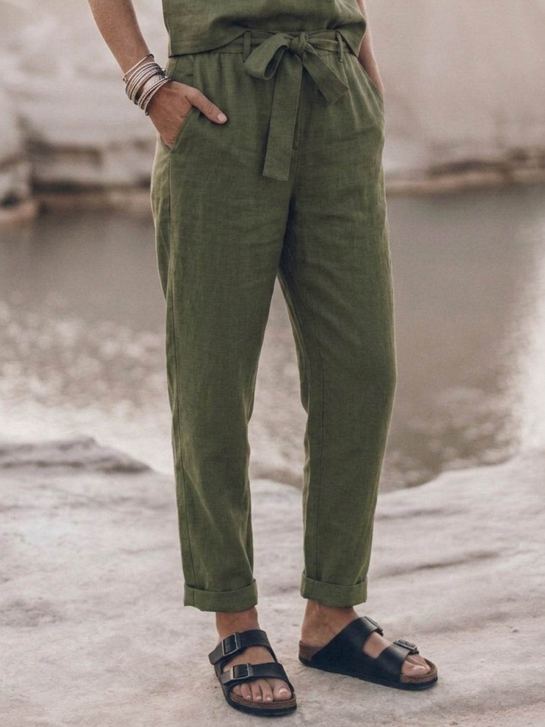 Woman wearing relaxed fit cotton linen set with short sleeves and drawstring pants in monochrome tones
