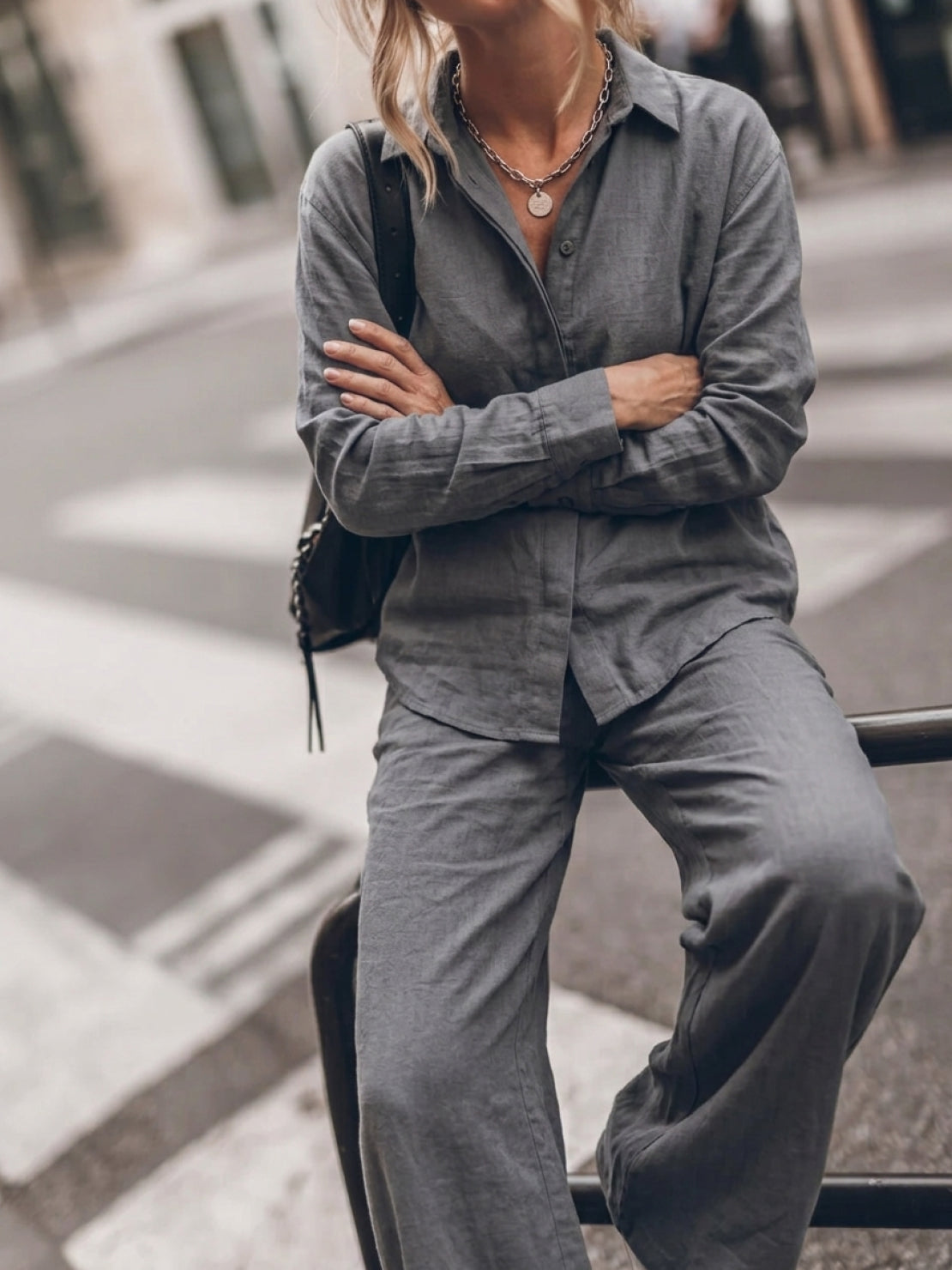 Model wearing an oversized 100% cotton shirt and wide-leg pants co-ord set in a relaxed, breathable design