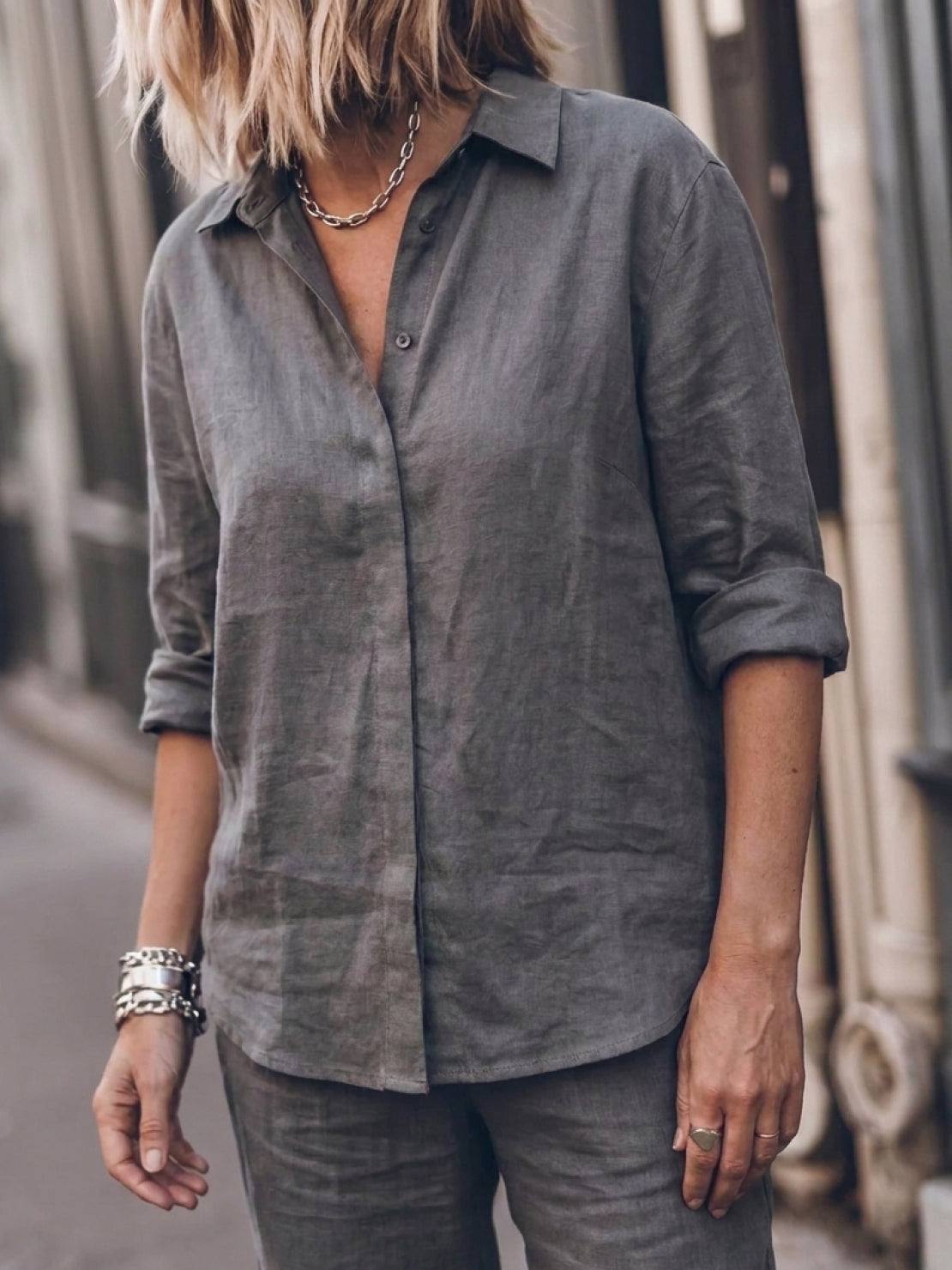 Woman wearing oversized 100% cotton shirt and wide-leg pants co-ord set in relaxed style